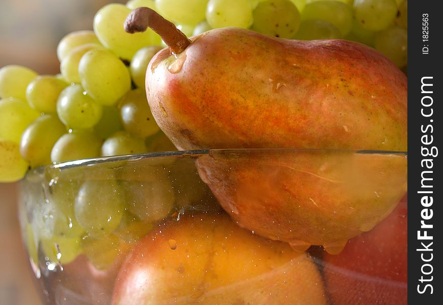 Fruit-piece with the bunch of grapes, pear and apple. Fruit-piece with the bunch of grapes, pear and apple