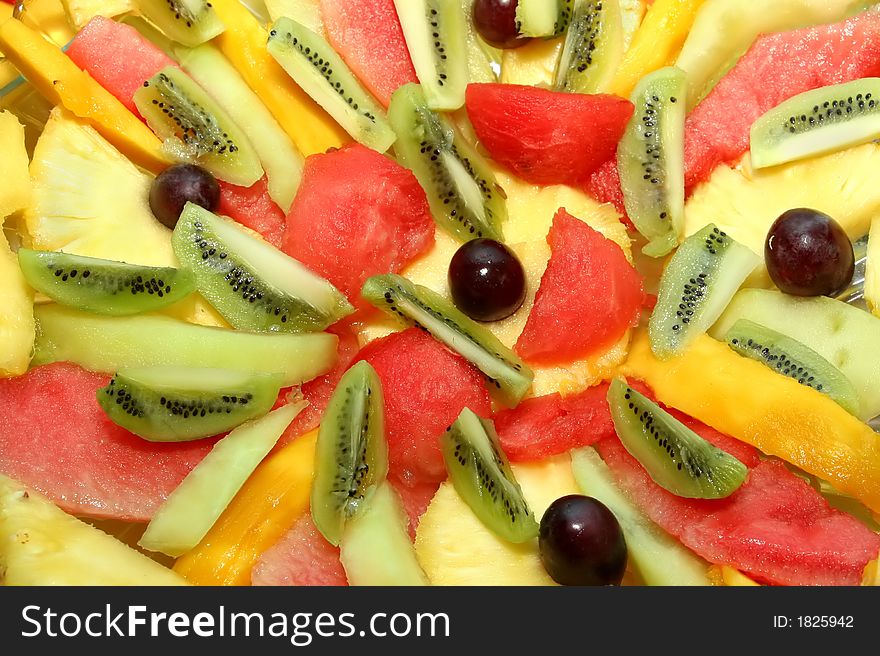 Several sliced pieces of fruit for background. Several sliced pieces of fruit for background