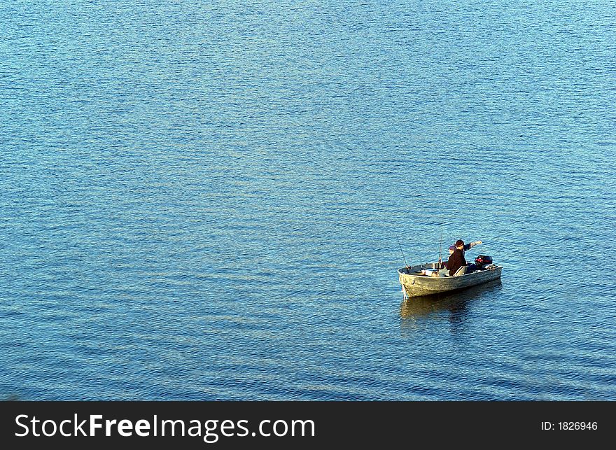 Two men fishing in a fishing boat