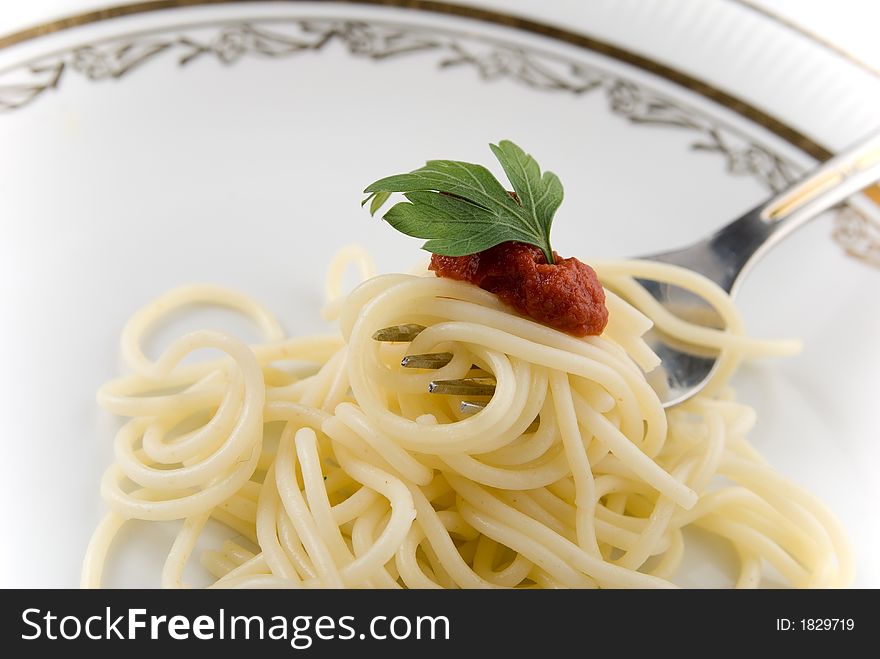 Spaghetti With Grawy On The Fork Close-up