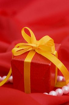 Box With A Gift On A Red Fabric Royalty Free Stock Photo Box With A Gift On A Red Fabric Royalty Free Stock Photo