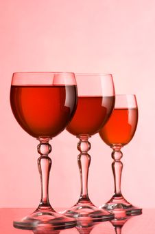 Wine Glasses With Wine On A Pink Background Royalty Free Stock Photos Wine Glasses With Wine On A Pink Background Royalty Free Stock Photos