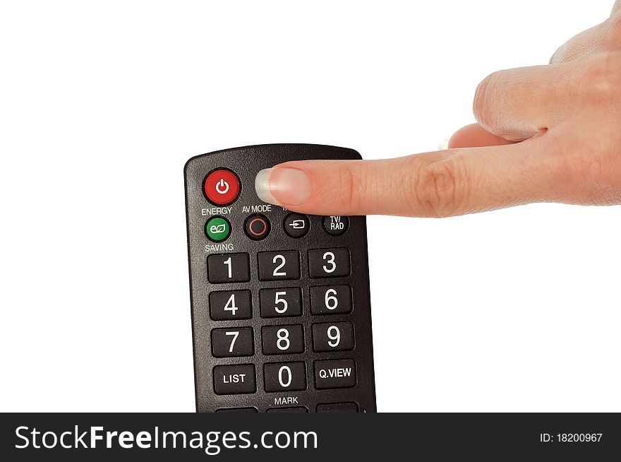 Woman holding a television control panel to turn the TV and to select an interesting channel. Woman holding a television control panel to turn the TV and to select an interesting channel