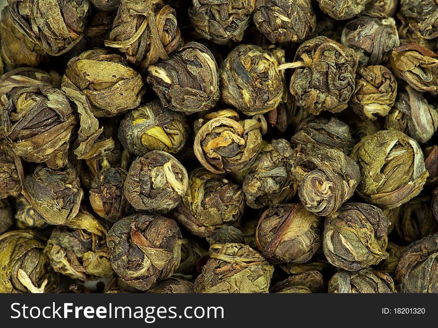 Close-up of green tea dry leaves