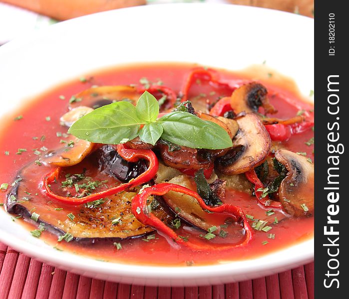 A fresh stew of eggplants, paprika and mushrooms. A fresh stew of eggplants, paprika and mushrooms