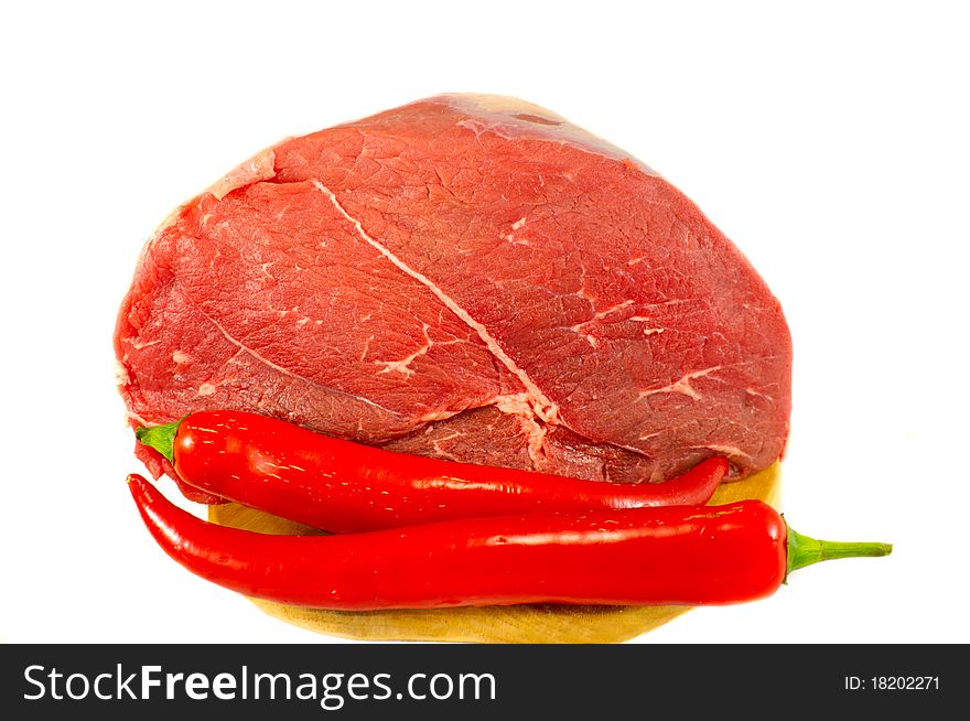The fresh beef and paprika isolated over white