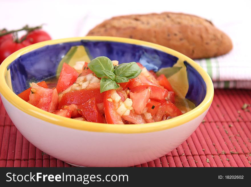 A fresh salad of tomatoes in a bowl