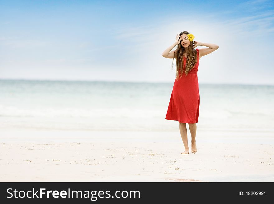 Young Smiling Woman On Beach