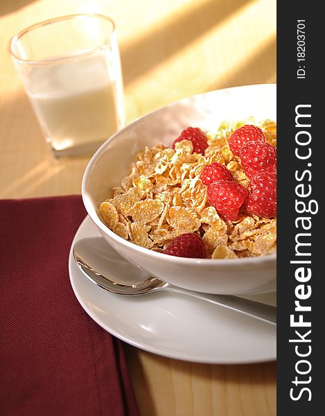 Wholesome breakfest servings of cereal, berries, and milk. Wholesome breakfest servings of cereal, berries, and milk