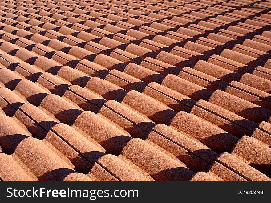 Red roof tiles pattern photo.