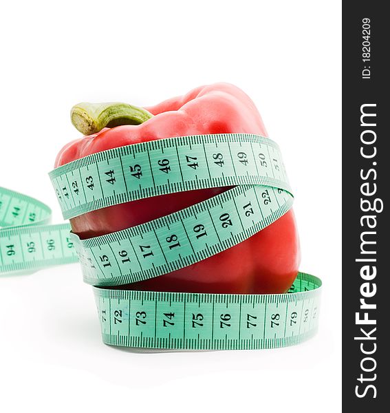 Bulgarian pepper and centimeter, white background, isolated