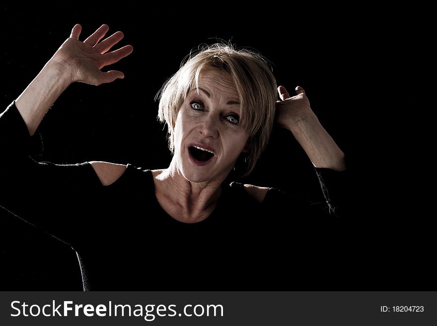 Acting Mature Woman, black background