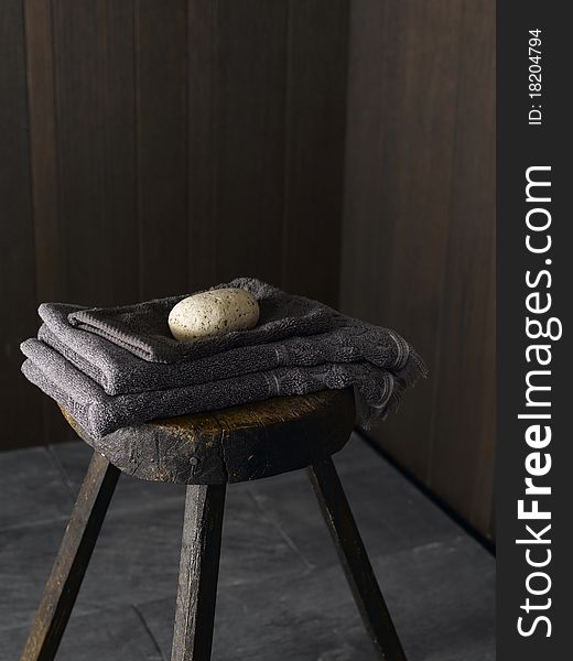 Wooden stool with sponge towel