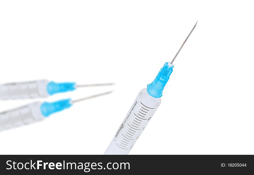 Medical syringe on a white background