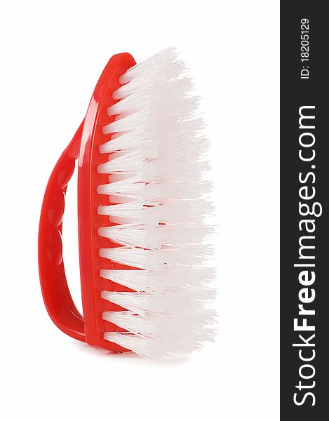 Red brush isolated on white background