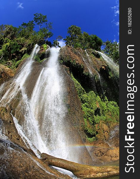 A big waterfall in the forest. A big waterfall in the forest