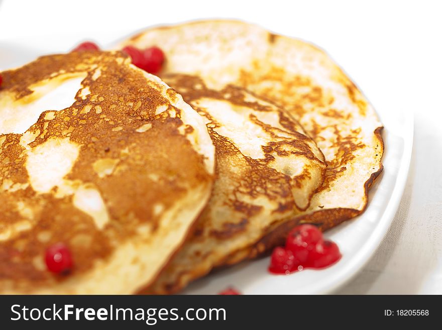 Tasty pancakes with a syrup, a close up