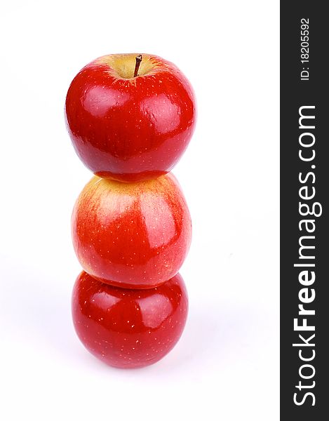 Red fresh apple on a white background