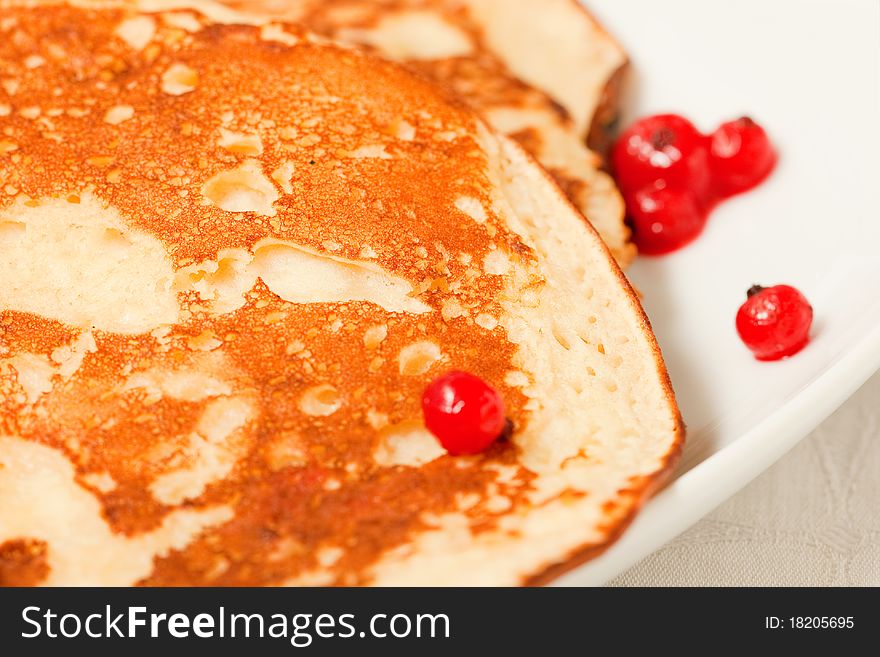 Tasty pancakes with a syrup, a close up