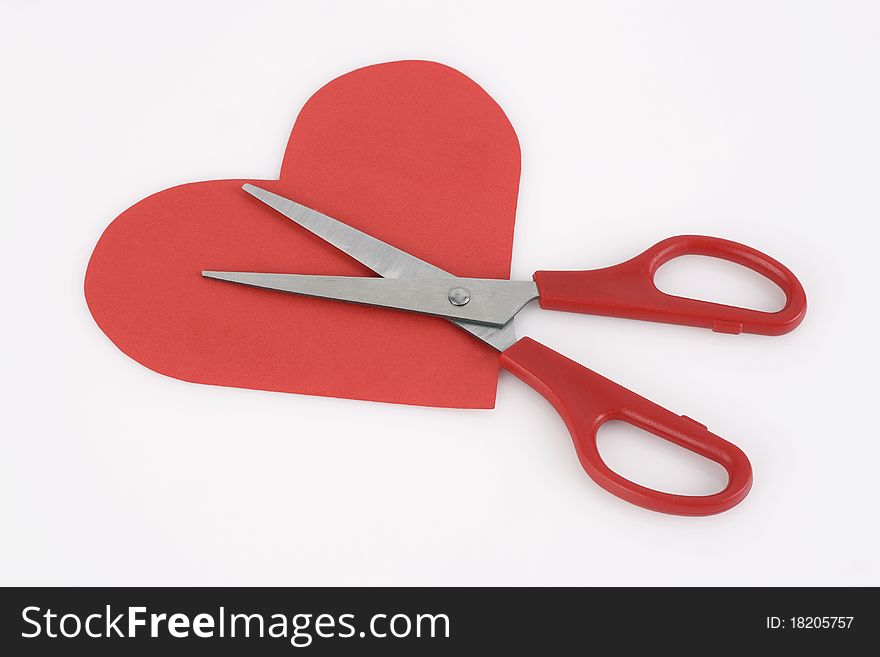 Red valentine heart and scissors