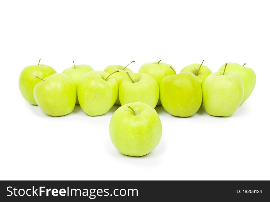 Green and yellow apples on a white baclground isolated