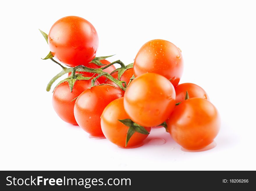 Contact red cherry tomatoes on a white background