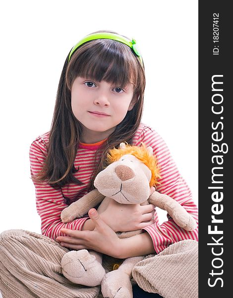 Portrait of beautiful young girl hugging toy tiger. Portrait of beautiful young girl hugging toy tiger