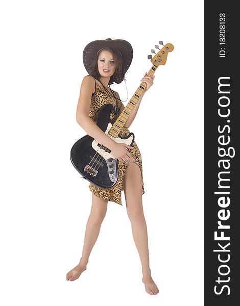 The girl in a hat plays a guitar. The girl in a hat plays a guitar
