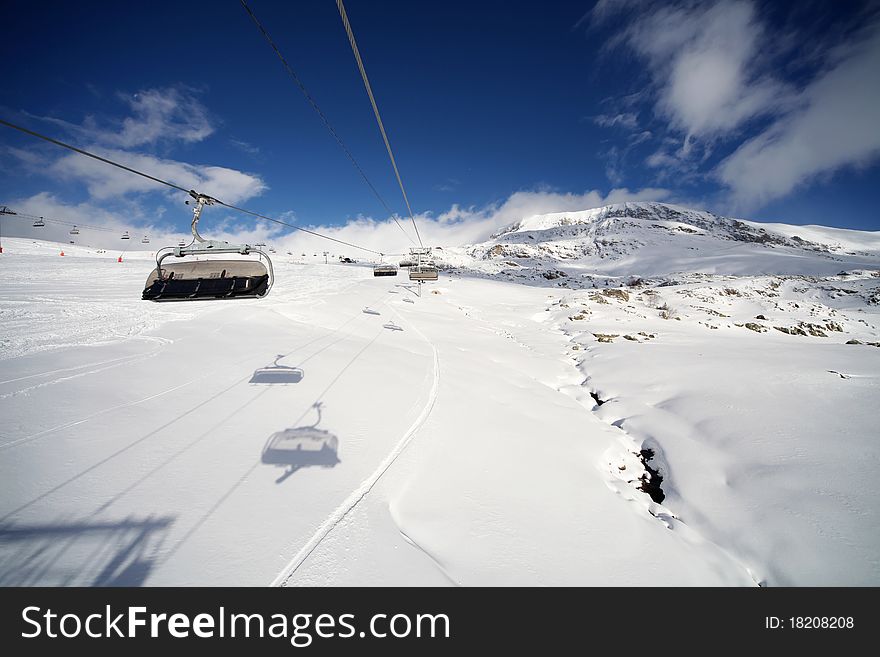 Ski slope after big dump of snow in Alpe d' Huez, France. Wide angle, photo taken 12.12.2010. Ski slope after big dump of snow in Alpe d' Huez, France. Wide angle, photo taken 12.12.2010.