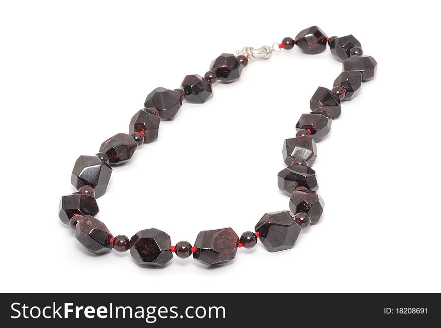 Garnet necklace isolated on a white background