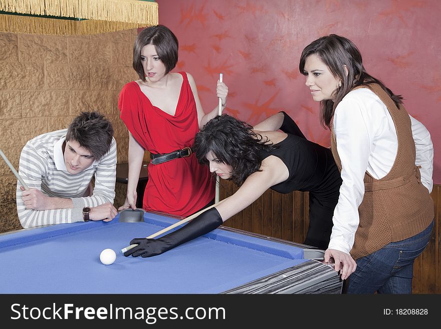Group of young boys playing pool