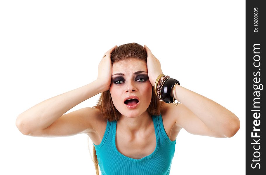 Girl in a dark makeup in blue T-shirt on white background with expression