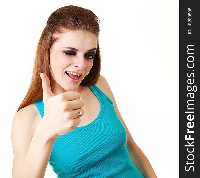 Portrait of attractive young girl showing a thumbs up