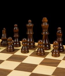 Chess Piece On Board Isolated On Black Stock Images Chess Piece On Board Isolated On Black Stock Images