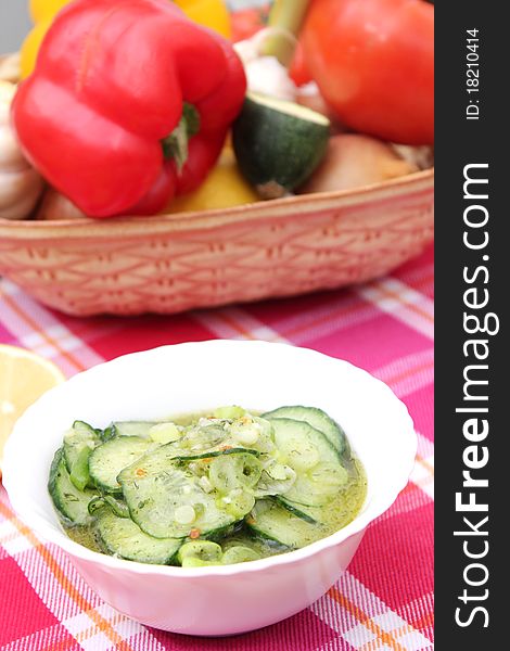 A fresh salad of cucumbers with onions