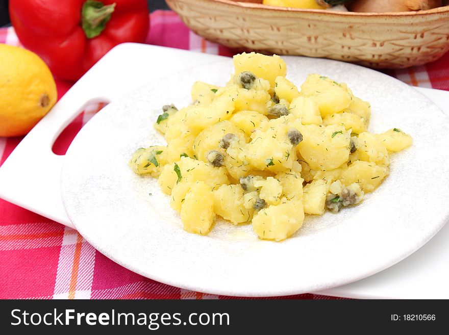 Fresh salad of potatoes on a plate