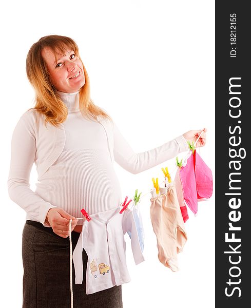 Beautiful pregnant woman staying on white background