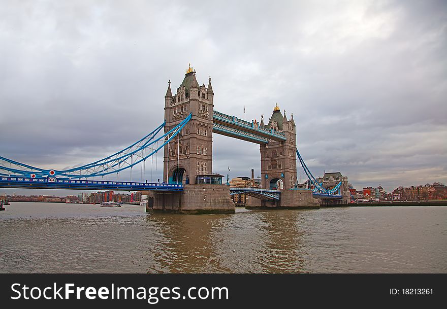 Tower bridge under cloudy winter sky. London. UK.