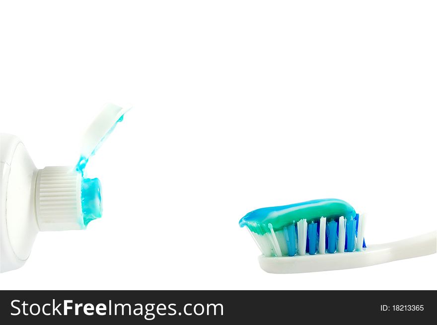 Tooth paste and tooth brush isolated over white