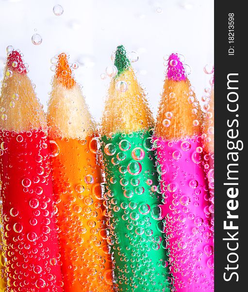 Colorful pencils and bubbles