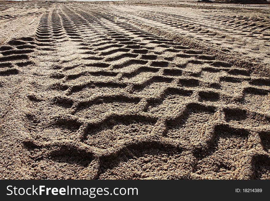 Trails of a dredger in the sand