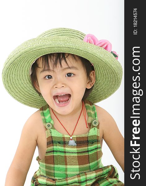 A laughing girl with a green hat.