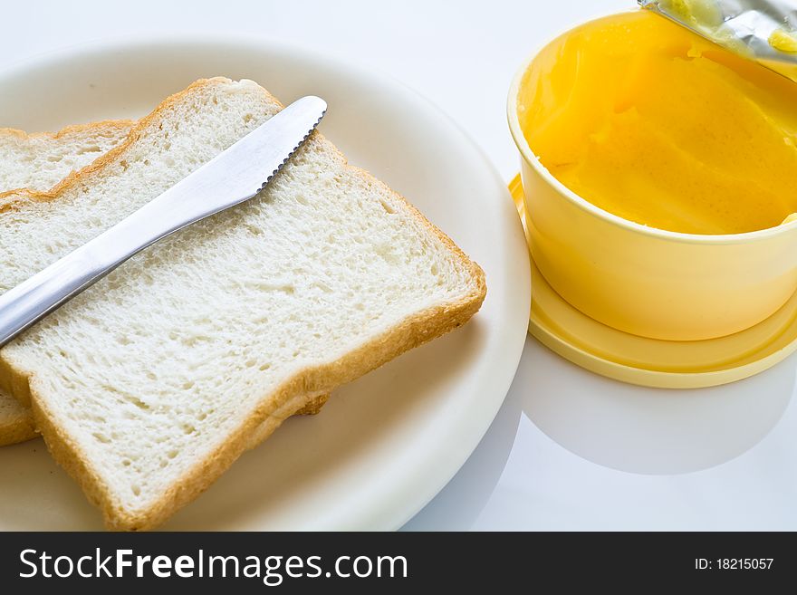 Clear bread with knife and butter. Clear bread with knife and butter