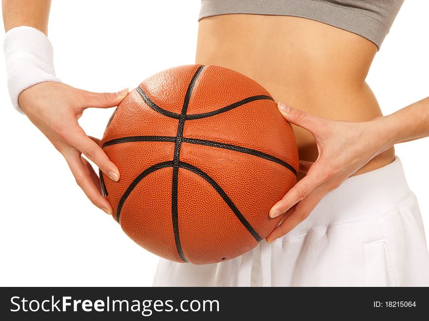 Basketball in beautiful woman basketball player hands. Close up composition isolated  over white background. Basketball in beautiful woman basketball player hands. Close up composition isolated  over white background