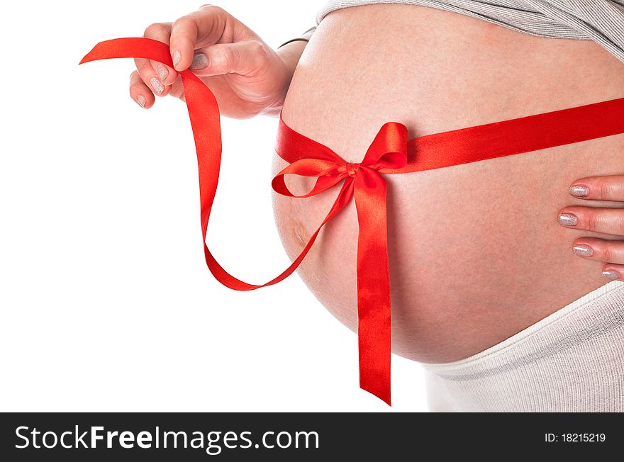 A belly of pregnant woman. isolated on a white background