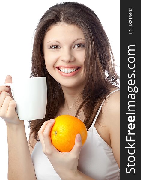 Beautiful young woman holding an orange. Close up. Beautiful young woman holding an orange. Close up