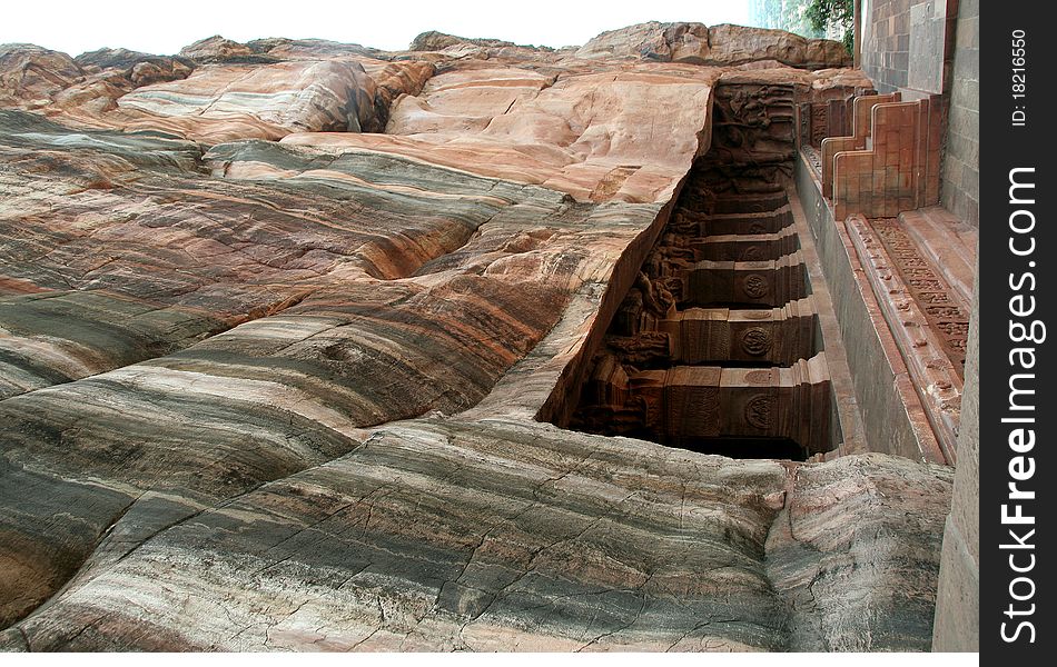 Cave temple cut under gigantic rock at Badami, Karnataka, India, Asia. Cave temple cut under gigantic rock at Badami, Karnataka, India, Asia