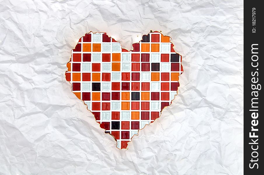 Vintage burnt paper in red mosaic heart