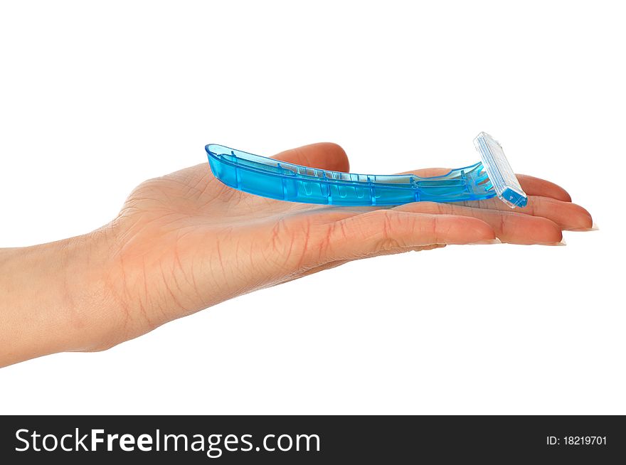 Woman holding a razor from a blue plastic for shaving legs