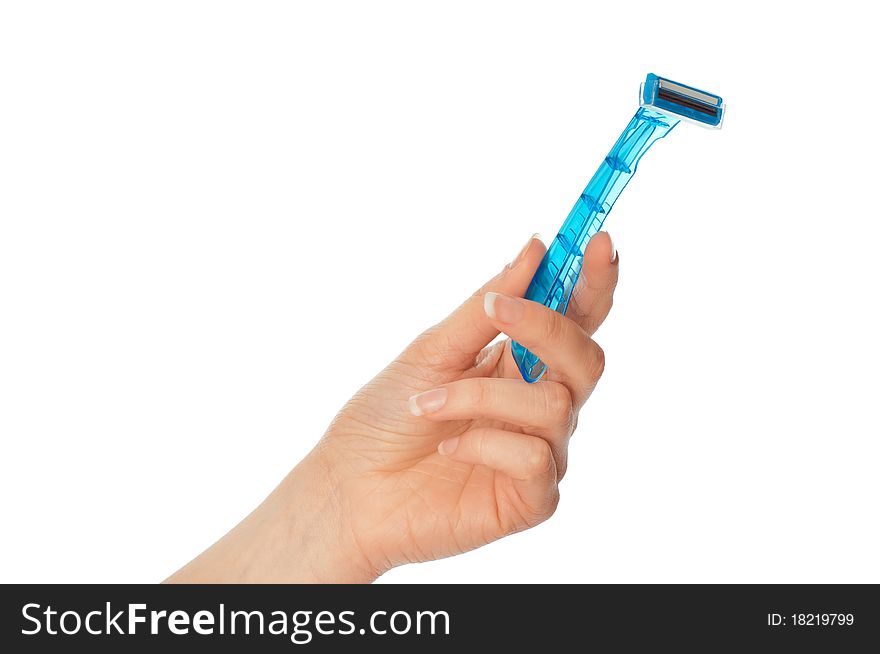 Woman holding a razor from a blue plastic for shaving legs